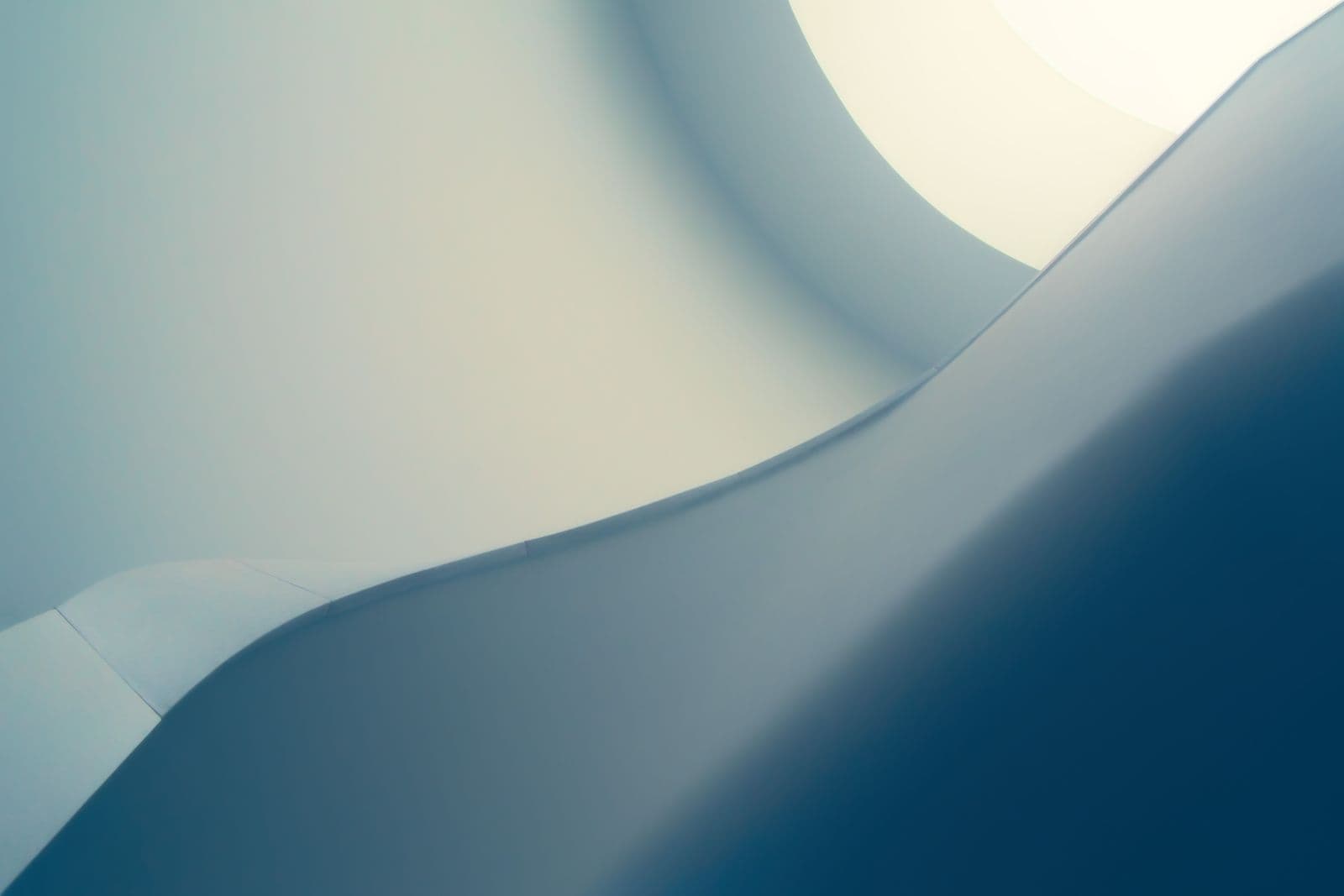Soft curved architectural forms lit by indirect daylight